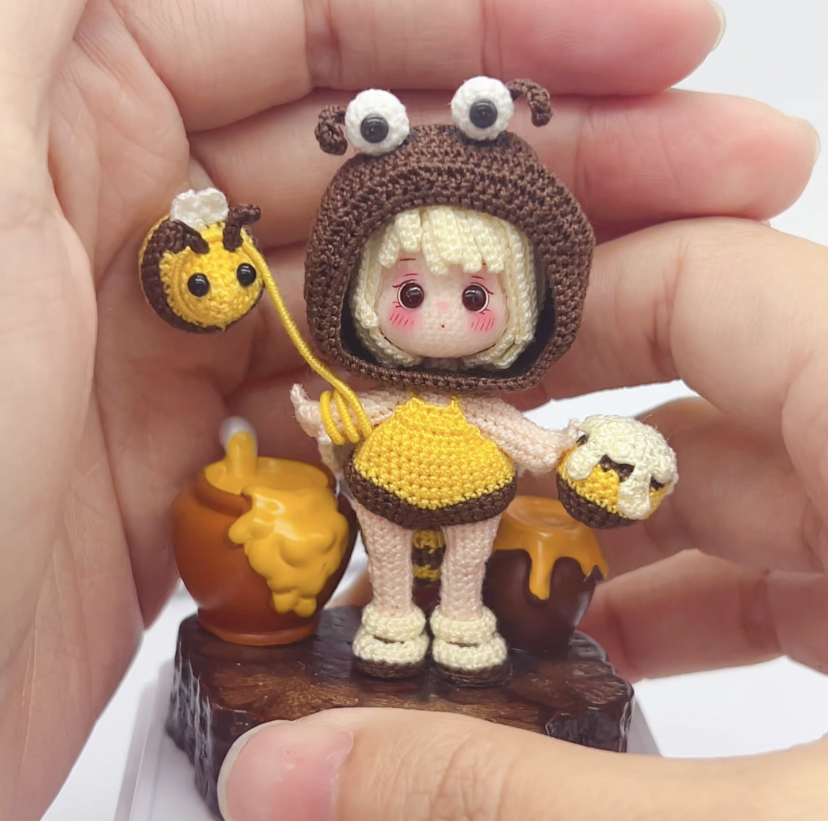 Only one micro-crochet bibi doll in stock, this crocheted artwork by hongjuanjuan