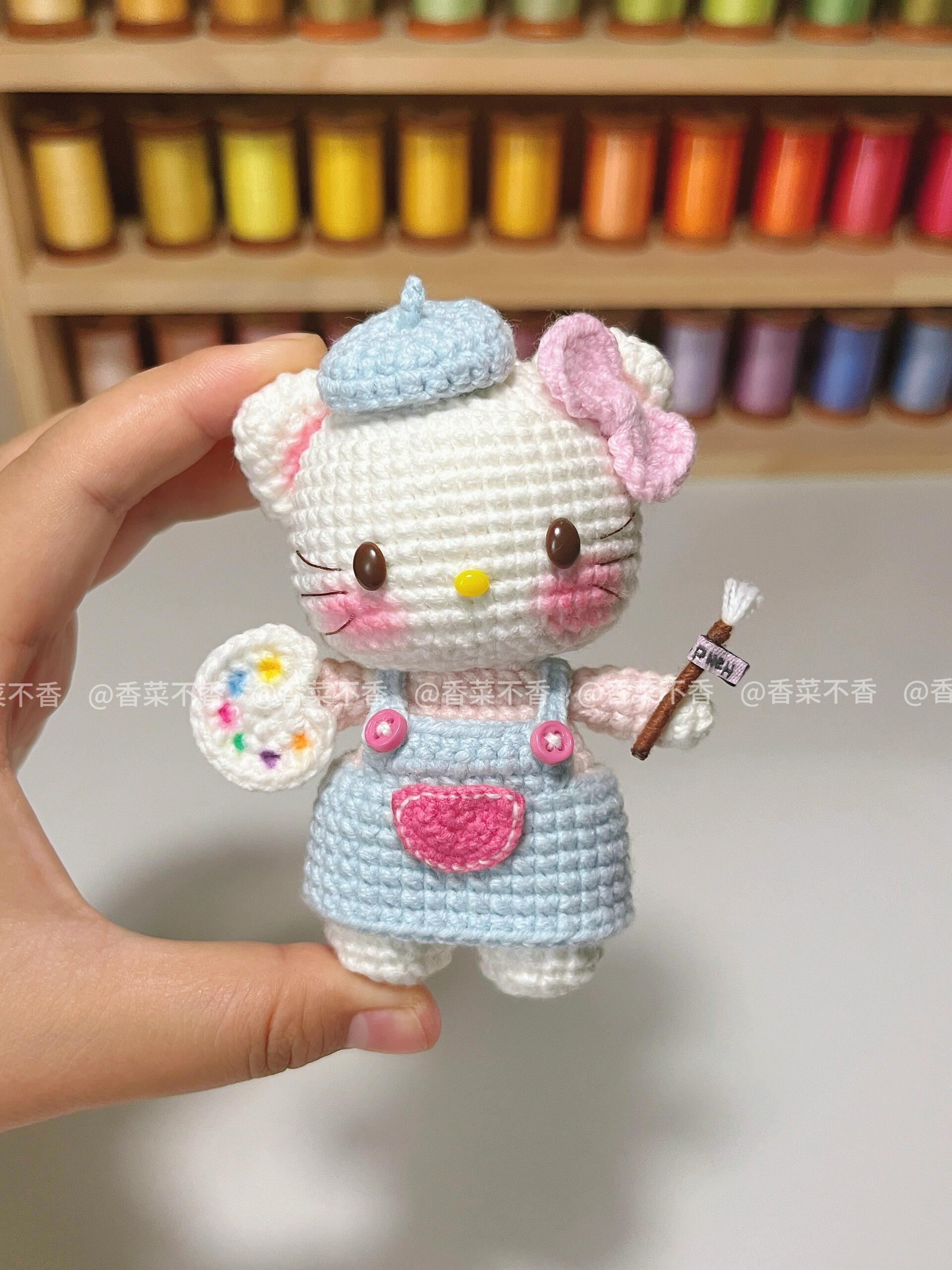 The crochet pattern for  painter kitty is included in the PDF file