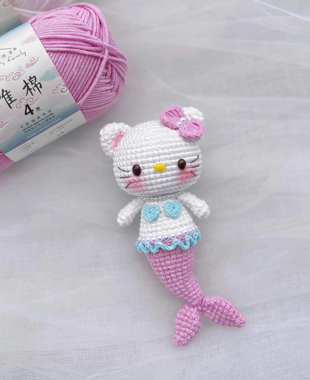 The crochet pattern for  mermaid kitty is included in the PDF file
